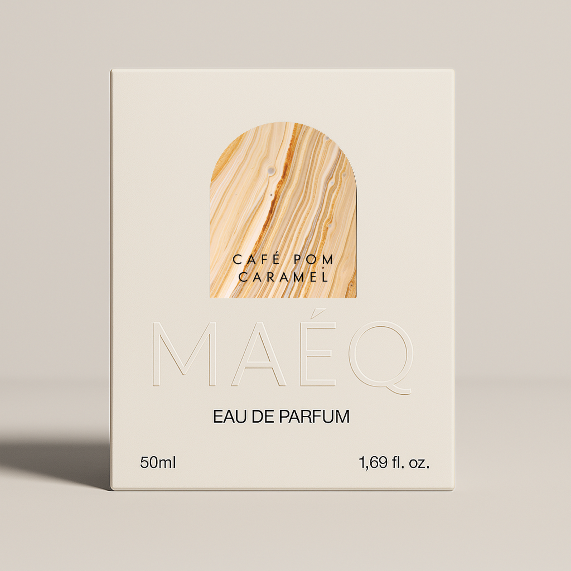 minimal white box packaging of perfume cafe pom caramel