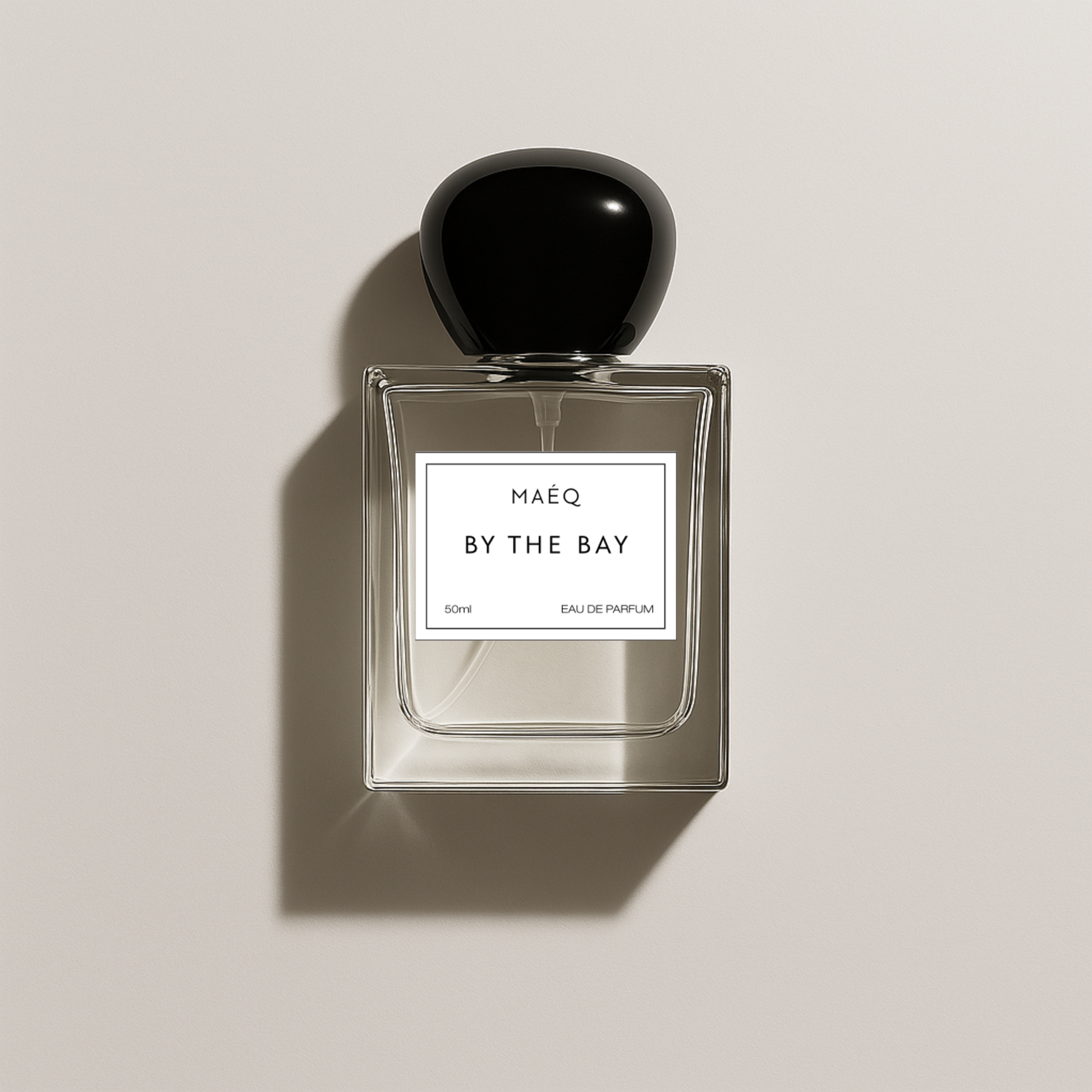 minimal transparent perfume bottle of maeq by the bay